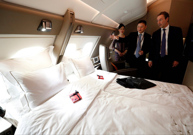 Airbus Chief Operating Officer Fabrice Bregier and Singapore Airlines CEO Goh Choon Phong take a tour of the newly launched Suites cabin on a Singapore Airlinesu00e2u20acu2122 A380 at Changi Airport in Singapore December 14, 2017. u00e2u20acu201d Reuters pic