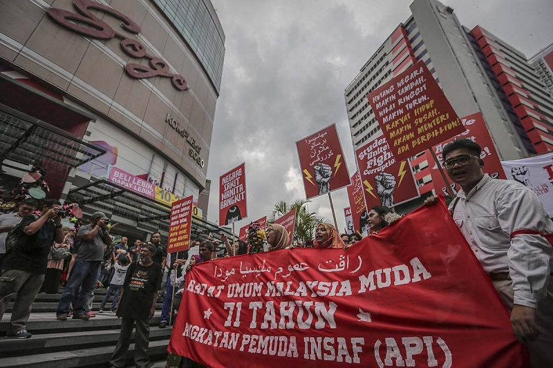 Some 100 Malaysian youth march in downtown Kuala Lumpur to commemorate the 71st anniversary of the formation of Angkatan Pemuda Insaf  December 23, 2017.   u00e2u20acu201d Picture by Firdaus Latif