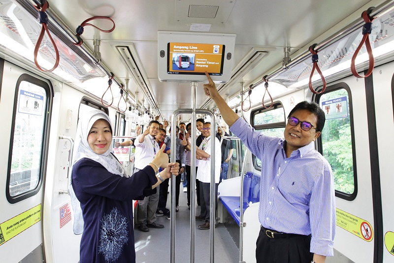 Datuk Zohari Sulaiman (right) said the four-car trains,  with vibrant new signage and additional features, would ensure more comfort and less waiting time for passengers. u00e2u20acu201d Picture via Twitter/RapidKL