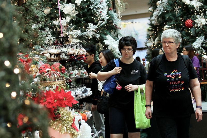 Shoppers buying Christmas gift items on sale at a shopping mall in Kuala Lumpur on December 10, 2017. u00e2u20acu201d Picture by Miera Zulyana