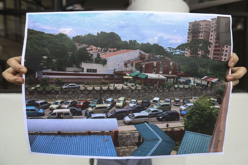 A photo of what Taman Desa residents say shows the traffic condition during school hours even before the developer had started works for The Address. ― Picture by Yusof Mat Isa