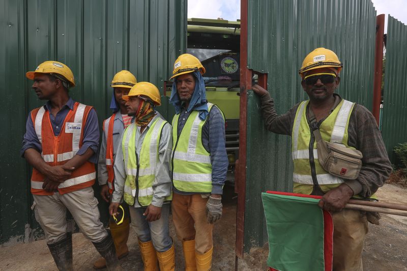 Construction workers are pictured at The Address' project site in Taman Desa, Kuala Lumpur. ― Picture by Yusof Mat Isa