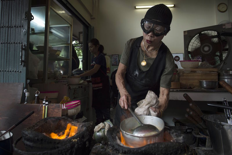 Jay Fai prepares a spicy soup in her restaurant, a day after her street-side eatery was recognised with a one-star Michelin guide, in Bangkok December 7, 2017. u00e2u20acu201d AFP pic