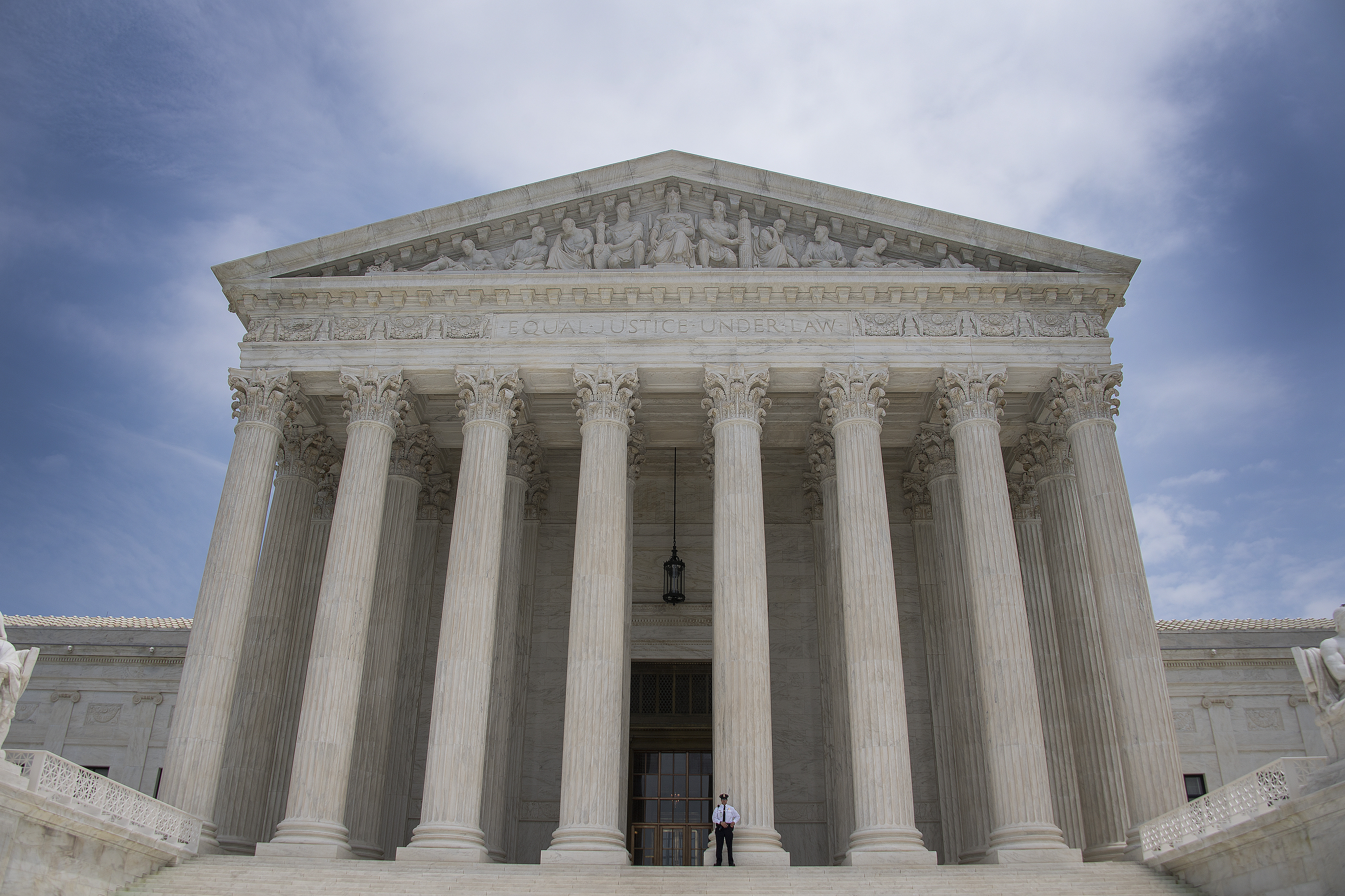 A police officer stands guard on the steps of the US Supreme Court in Washington June 15, 2017. u00e2u20acu201d AFP pic  