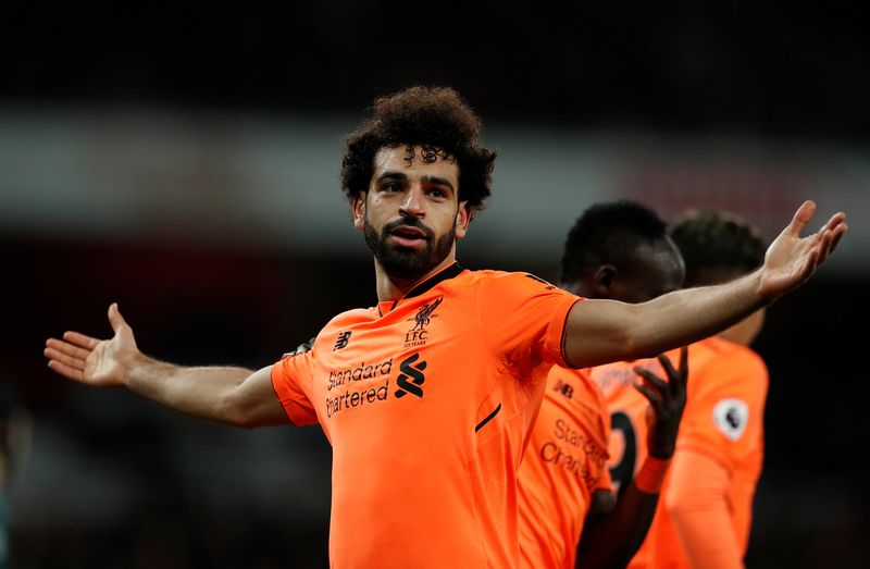 Liverpoolu00e2u20acu2122s Mohamed Salah celebrates scoring their second goal against Arsenal during their Premier League match at Emirates Stadium, London, December 22, 2017. u00e2u20acu201d Reuters pic