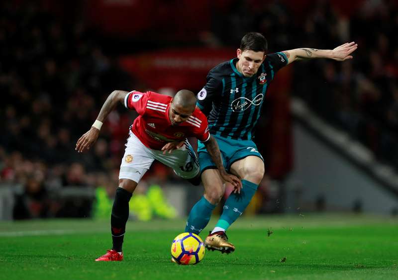 Manchester Unitedu00e2u20acu2122s Ashley Young in action with Southamptonu00e2u20acu2122s Pierre-Emile Hojbjerg during their Premier League match at Old Trafford, Manchester, December 30, 2017. u00e2u20acu201d Reuters pic