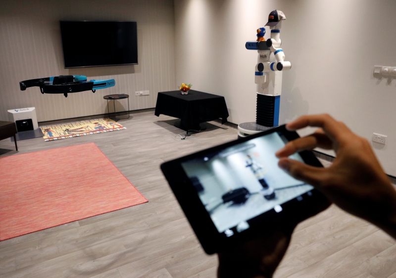 NUS School of Computing researcher Lan Ziquan showcases their project Xpose, an interactive drone photo-taking system, at their faculty premises in Singapore November 27, 2017. u00e2u20acu201d Reuters pic