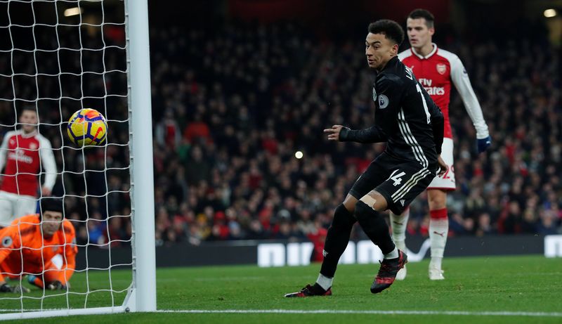 Manchester Unitedu00e2u20acu2122s Jesse Lingard scores their third goal against Arsenal during their Premier League match at Emirates Stadium, London, December 2, 2017. u00e2u20acu201d Reuters pic