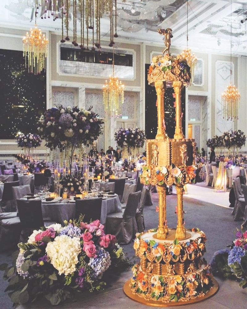 The RM19,000 wedding cake made from brandy-infused fruit cake coated with Belgian marzipan. — Picture from Karen Leong Cake Design Facebook page