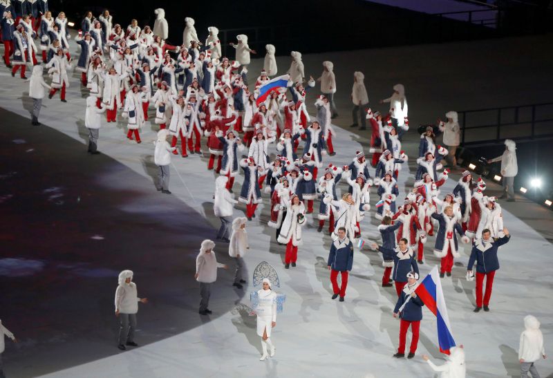 Russia's flag-bearer Alexander Zubkov leads his country's contingent during the opening ceremony of the 2014 Sochi Winter Olympics, February 7, 2014. u00e2u20acu2022 Reuters pic