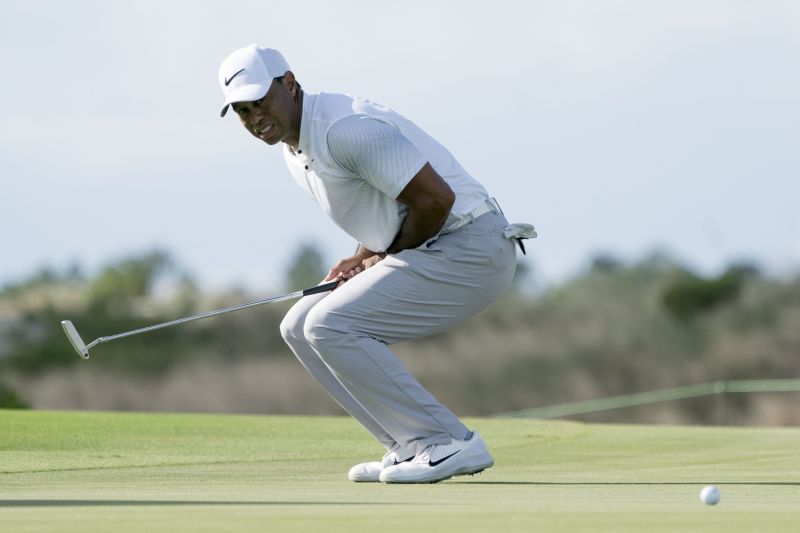 Tiger Woods reacts after missing his putt on the 13th hole during the second round of the Hero World Challenge golf tournament at Albany. u00e2u20acu2022 Reuters pic