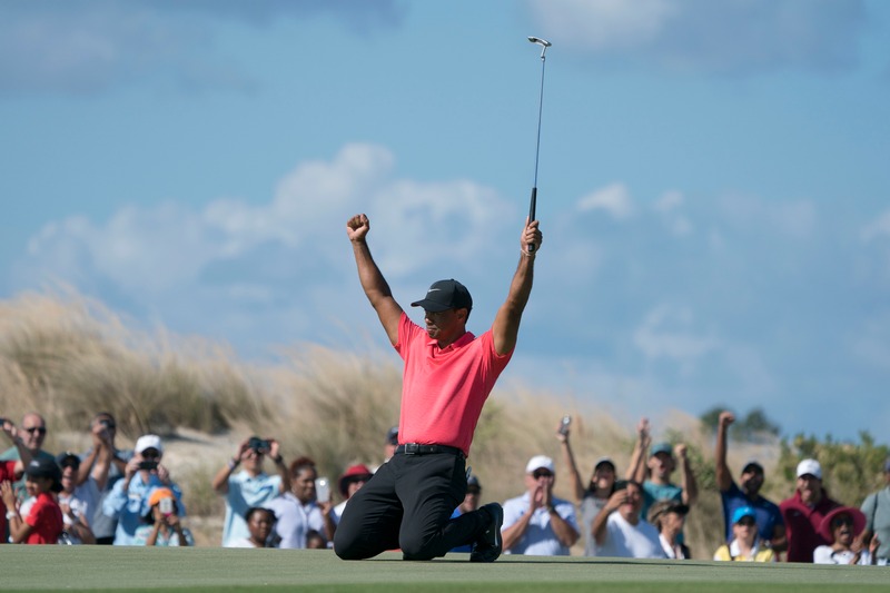Tiger Woods celebrates after making his eagle putt on the seventh hole of the final round in the Hero World Challenge golf tournament at Albany, Bahamas December 3, 2017. u00e2u20acu201d USA TODAY Sports/Reuters pic