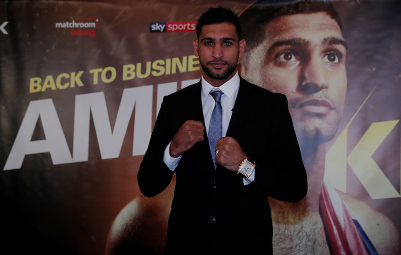Amir Khan poses after a press conference announcing the end of his two-year hiatus from boxing in London January 10, 2018. u00e2u20acu201d Action Images pic via Reuters