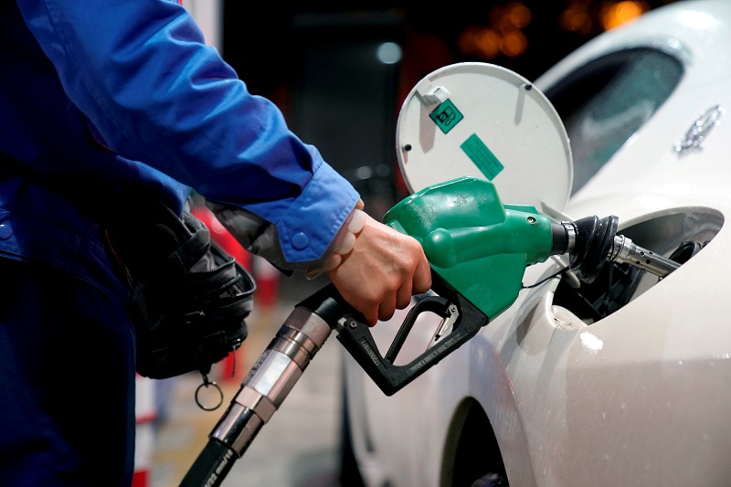 A gas station attendant pumps fuel into a customeru00e2u20acu2122s car at a gas station in Shanghai November 17, 2017. u00e2u20acu201d Reuters pic
