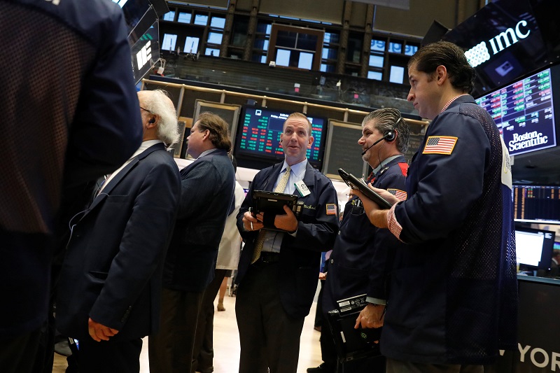 Traders work on the floor of the New York Stock Exchange shortly after the opening bell in New York January 12, 2018. u00e2u20acu201d Reuters