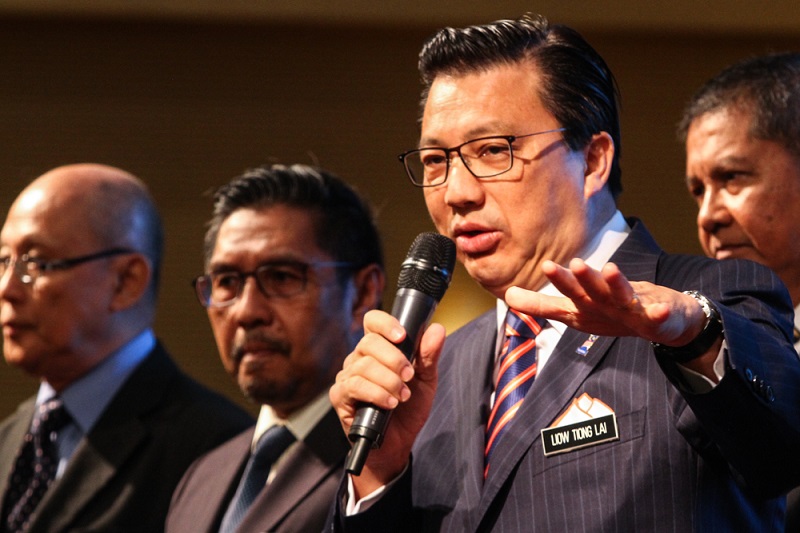 Transport Minister Datuk Seri Liow Tiong Lai (right) speaks during a press conference in Kuala Lumpur January 10, 2018. u00e2u20acu201d Picture by Shafwan Zaidon
