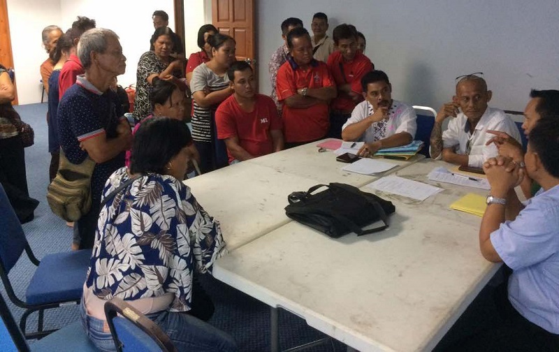 Human rights activist Peter John Jaban (3rd from right) accompanies the 23 applicants in a meeting with NRD officers in Kuching January 10, 2018. u00e2u20acu201d Picture by Sulok Tawie