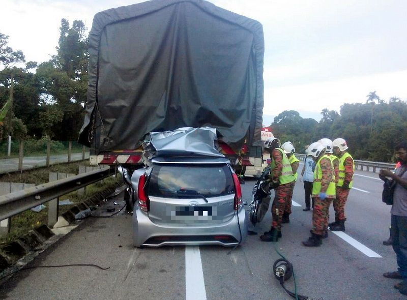 A 44-year-old network engineer from South Korea died after his Perodua MyVi rammed into a stationary lorry at KM226.1 northbound of the North South Expressway near Taiping January 11, 2018. u00e2u20acu201d Picture courtesy of Perak Fire and Rescue Department