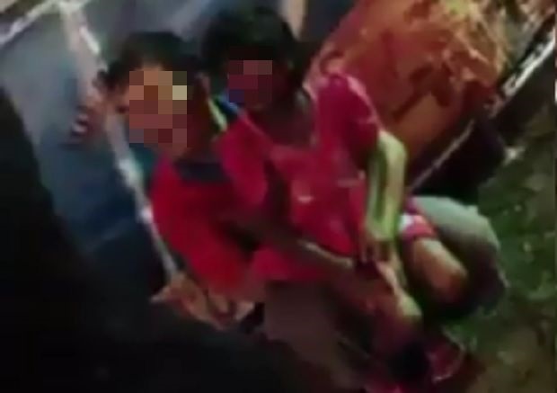 A 20-second clip of the video which appeared to have been recorded with a smartphone camera shows a man holding on tightly to a very young girl and kissing her face.