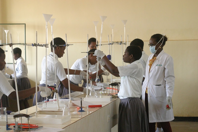 Secondary school students work in the chemistry lab at the FAWE Girlsu00e2u20acu2122 School in Gisozi, Rwanda October 18, 2017. u00e2u20acu201d Thomson Reuters Foundation pic