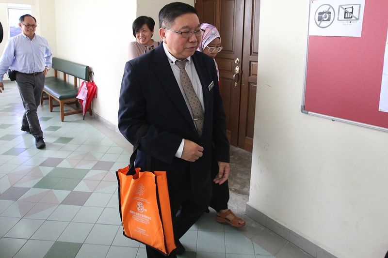 SJKC Yuk Chai headmaster Chew Hock Jin exits the court room during a recess, January 16, 2018. u00e2u20acu201d Picture by Azinuddin Ghazali
