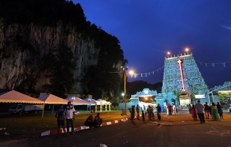 Only a thin crowd of people can be seen at the Kallumalai Arulmigu Subramaniar Temple in Gunung Cheroh due to the lunar eclipse, January 31, 2018. u00e2u20acu201d Picture by Farhan Najib