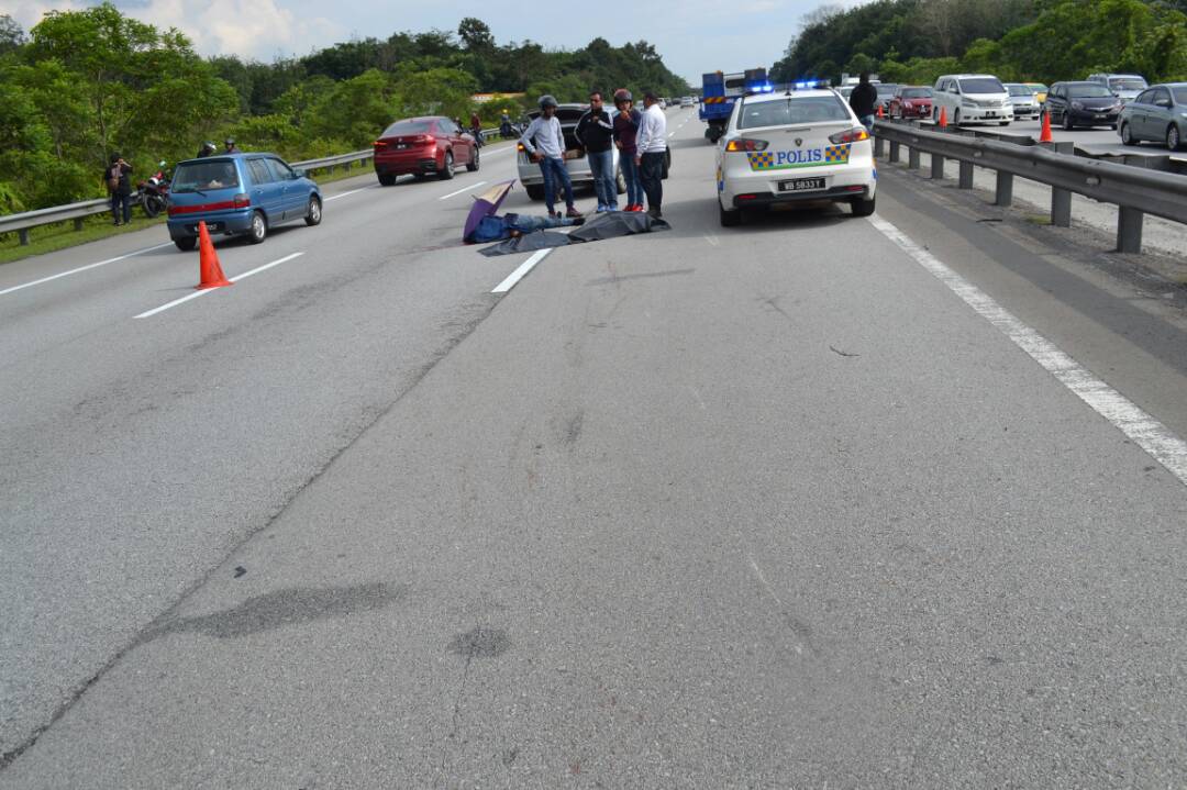The bodies of Mohd Hairric Mohd Hafiz Chandar, 28, and Mohd Syazwan Naim Mohd Sandradee, 26 after the accident in Tanjung Malim January 21, 2018. u00e2u20acu201d Picture courtesy of Royal Malaysian Police