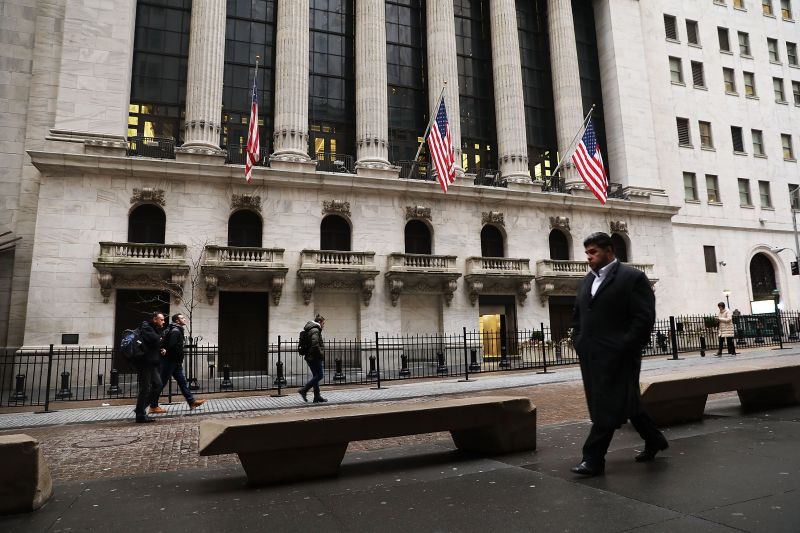 People walk by the New York Stock Exchange (NYSE) in New York January 20, 2018. u00e2u20acu201d AFP pic