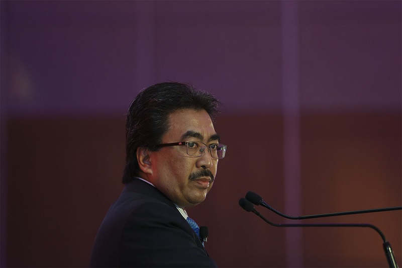 Second Finance Minister Datuk Seri Johari Abdul Ghani delivers his keynote address during CIMB 10th Annual Malaysia Corporate Day in Kuala Lumpur January 4, 2018. u00e2u20acu201d Picture by Yusof Mat Isa