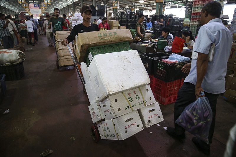 Some employers say the locals don’t have the stamina to work late into the night or do physically taxing work such as heavy lifting in wet markets.