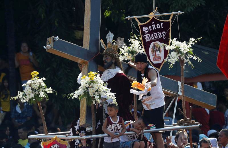 Devotees parade a replica of an image of Black Nazarene during the annual religious procession in Manila  January 9, 2018. u00e2u20acu201d Saudi Press Agency handout via Reuters