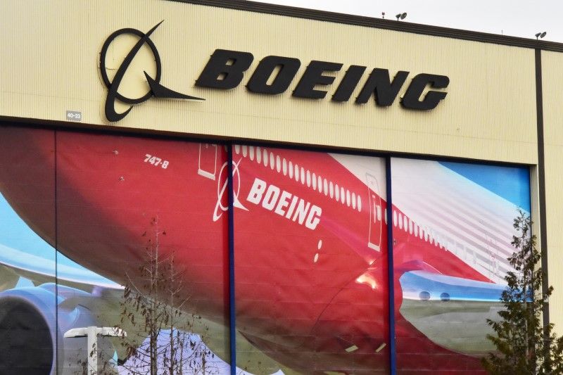 Boeing Co's logo is seen above the front doors of its largest jetliner factory in Everett, Washington. u00e2u20acu2022 Reuters pic