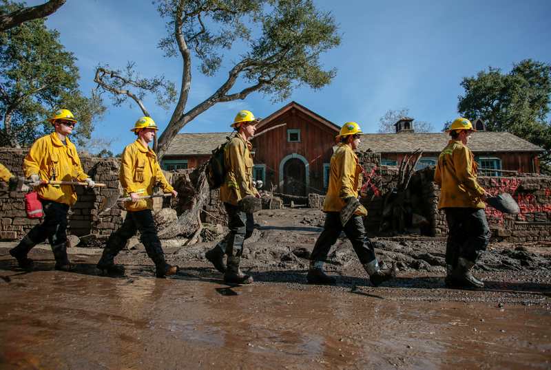 Rescue workers enter properties to look for missing persons after a mudslide in Montecito, California January 12, 2018. u00e2u20acu201d Reuters pic