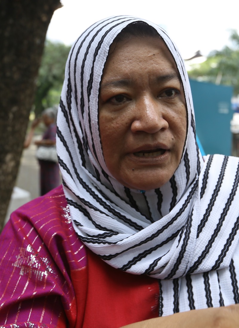 PPR Sri Pantai resident Zubaidah Abdul Rashid, 46, says out-of-service lifts often leave residents with no option but to give up on proper garbage disposal. — Picture by Zuraneeza Zulkifli