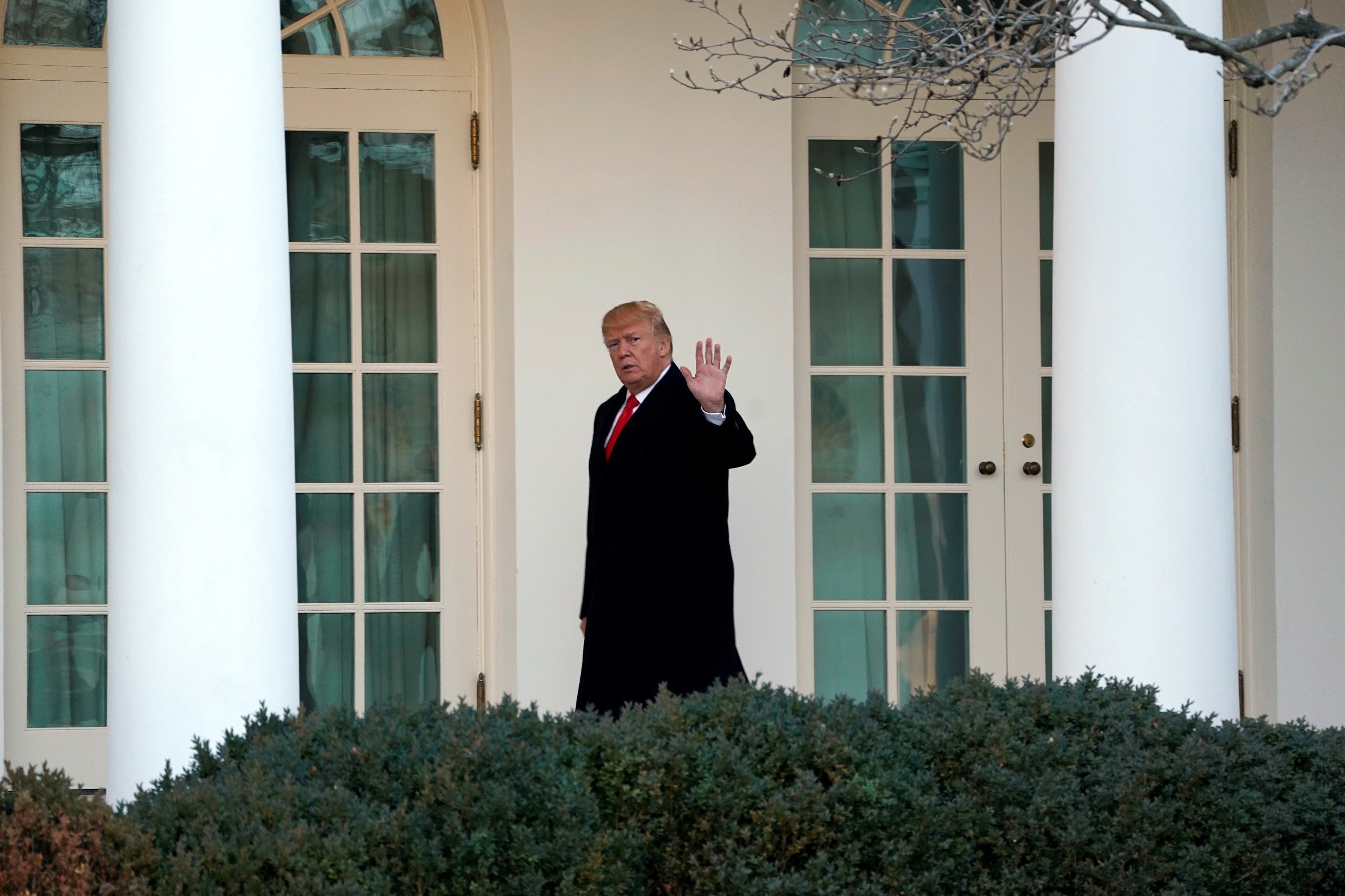US President Donald Trump waves as he walks to the Oval Office of the White House upon his return in Washington from Pittsburgh, January 18, 2018. u00e2u20acu201d Reuters pic