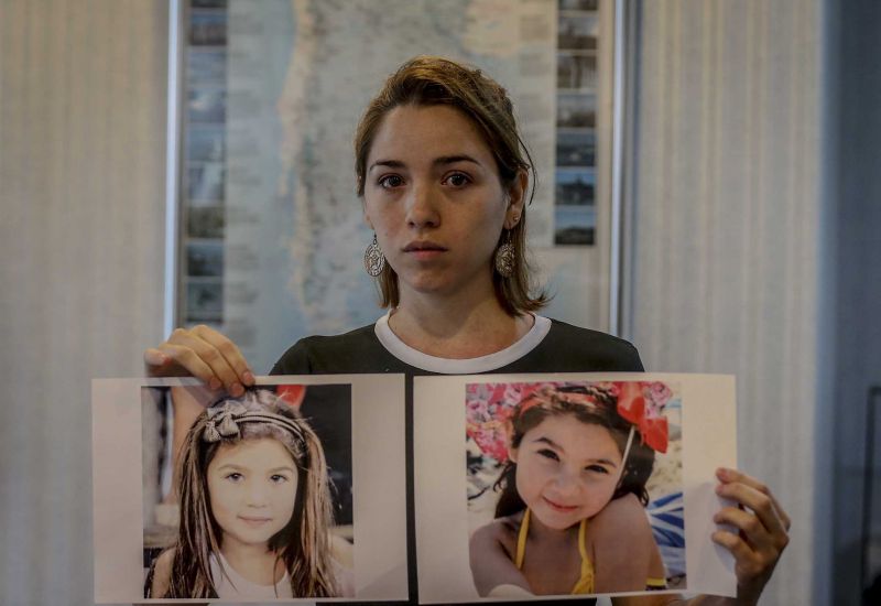 Elizabeth Avalos shows a picture of her daughter during a press conference at the Argentinian Embassy in Kuala Lumpur January 24, 2018. u00e2u20acu2022 Picture by Firdaus Latif