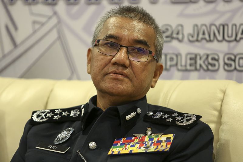 IGP Tan Sri Mohamad Fuzi Harun speaks during a press conference after the launch of the Criminal Investigation handbook and Criminal Investigation Instruction book in Kuala Lumpur January 24, 2018. u00e2u20acu2022 Picture by Yusof Mat Isa 