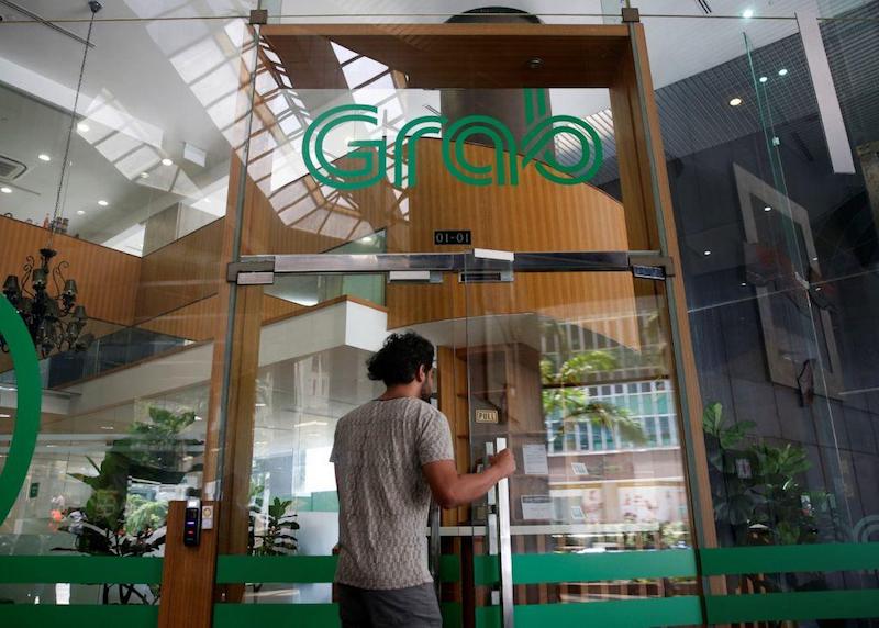 Grabpay would be rolled out to tourist hotspots such as hawker centres and dining establishments.  u00e2u20acu201d Reuters pic
