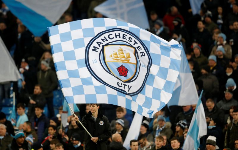 Manchester City fans wave a flag. u00e2u20acu2022 Reuters pic