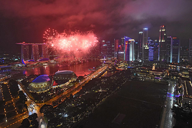 Fireworks burst over the skyline during an hourly display leading up to the final countdown for the New Year 2018 celebrations in Singapore on December 31, 2017. — AFP pic