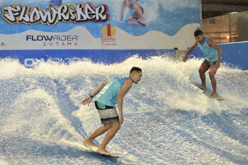 A professionally trained and qualified skydiver performs aerobatic manoeuvres in the AirRider's circular wind tunnel. — Malay Mail pic