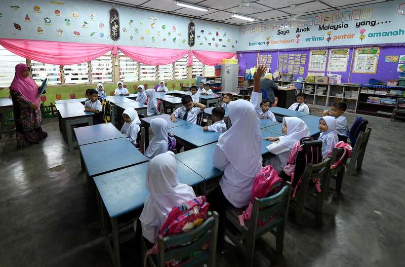 First year students at Sekolah Kebangsaan Bukit Sawa are seen in class on the first day of school in Marang January 1, 2018. u00e2u20acu201d Bernama pic
