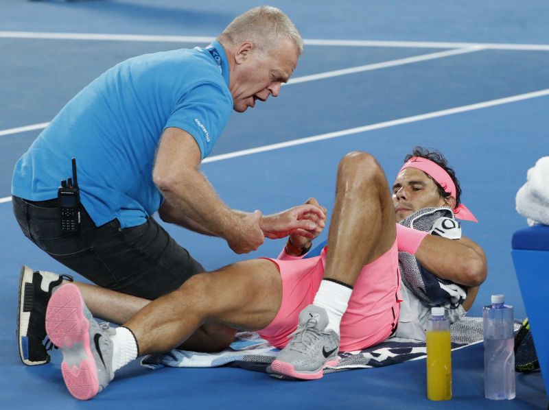 Spain's Rafael Nadal receives medical attention during his match against Croatia's Marin Cilic. u00e2u20acu201d Reuters pic
