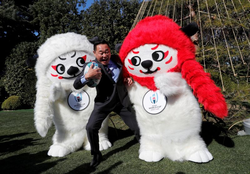 Ren (left) and G, official mascots for the 2019 Rugby World Cup in Japan, poses with a supporter of the Rugby World Cup during a photo session at its unveiling in Tokyo January 26, 2018. u00e2u20acu201d Reuters pic