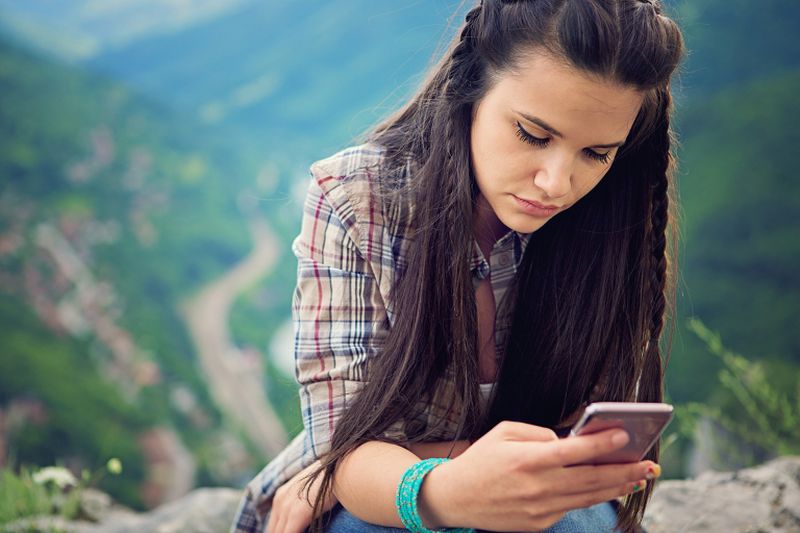 New research suggests that being addicted to smartphones could be reducing teenagers' psychological wellbeing. u00e2u20acu2022 AFP pic