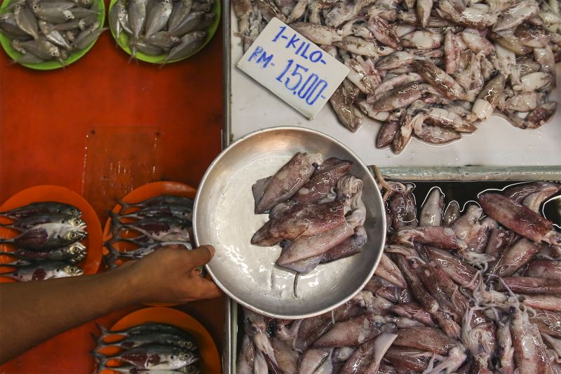 Squid is displayed for sale at a wet market in Kuala Lumpur on January 5, 2018. 
