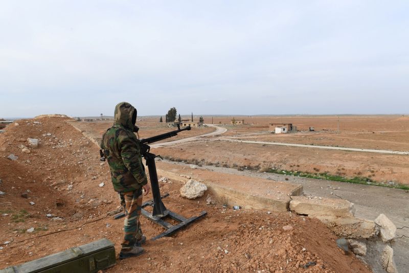 A Syrian Army soldier loyal to Syria's President Bashar al-Assad forces stands next to a military weapon in Idlib January 21, 2018. u00e2u20acu201d Reuters pic