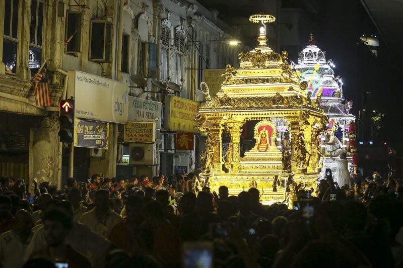 Lord Muruganu00e2u20acu2122s silver and gold chariots make their way through downtown Kuala Lumpur to the Batu Caves temple, January 29, 2018. u00e2u20acu2022 Picture by Yusof Mat Isa 