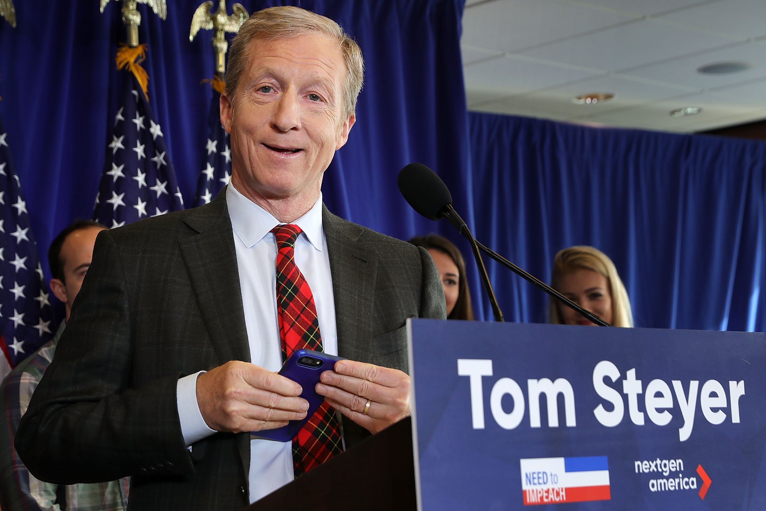 Hedge fund billionaire, Democratic mega-donor and environmentalist Tom Steyer silences his mobile device during a news conference regarding his political future and plans January 8, 2018 in Washington. u00e2u20acu201d AFP pic 