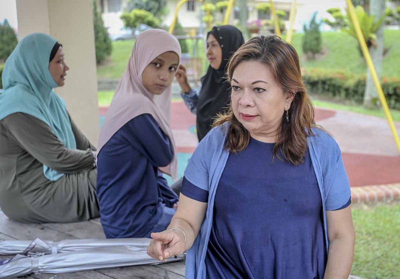 Resident, Adibah Zainualdin, speaks to Malay Mail over the alleged poisoning of several cats within the grounds of condominium.